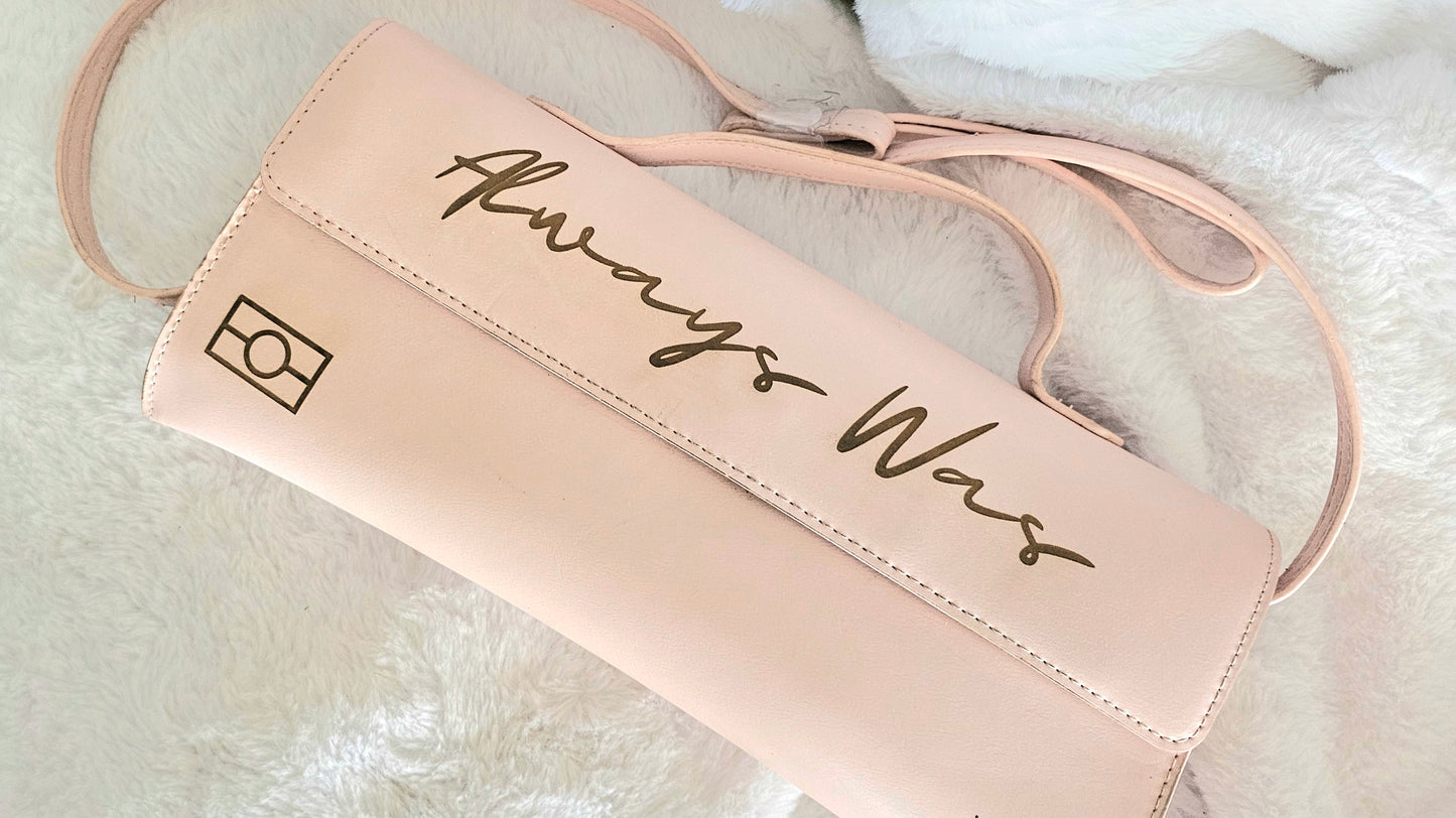 Baby pink clutch with long strap