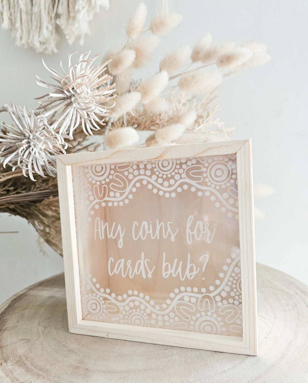 Any coins for cards bub? Money box